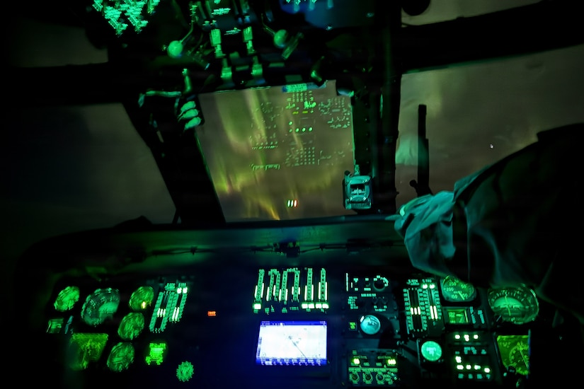 Alaska Army National Guardsmen Conduct a Nighttime Medical Evacuation